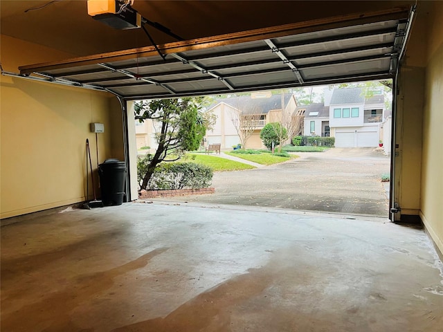 garage featuring a garage door opener