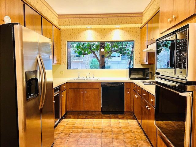 kitchen with sink and black appliances