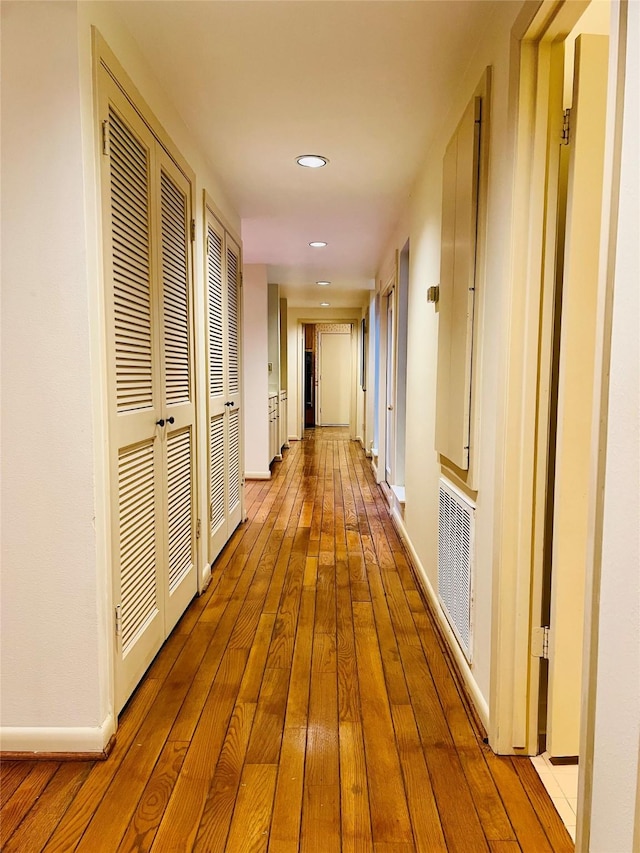 corridor featuring light hardwood / wood-style flooring