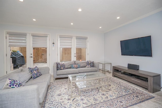 living room with crown molding and french doors