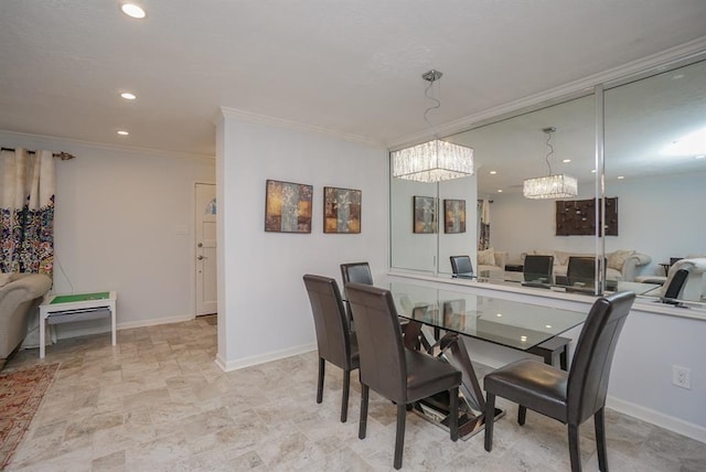 dining area featuring an inviting chandelier and crown molding