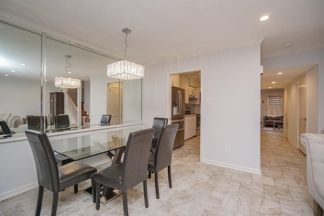 dining room with an inviting chandelier and ornamental molding