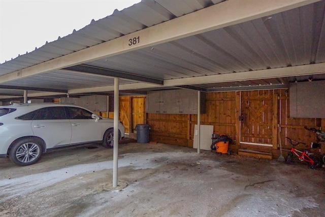 garage with wood walls