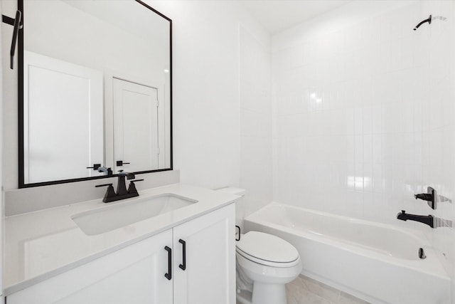 bathroom with shower / washtub combination, vanity, and toilet