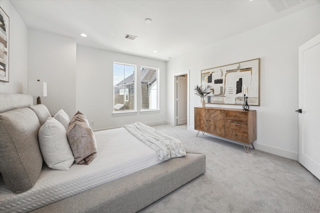 bedroom with baseboards, recessed lighting, visible vents, and light colored carpet