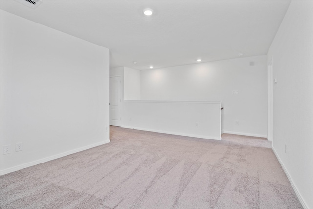 interior space featuring baseboards, carpet flooring, and recessed lighting