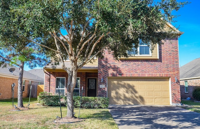 view of front of house featuring a garage and a front lawn