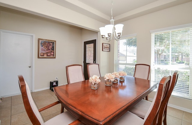 dining area with a notable chandelier and light tile patterned flooring