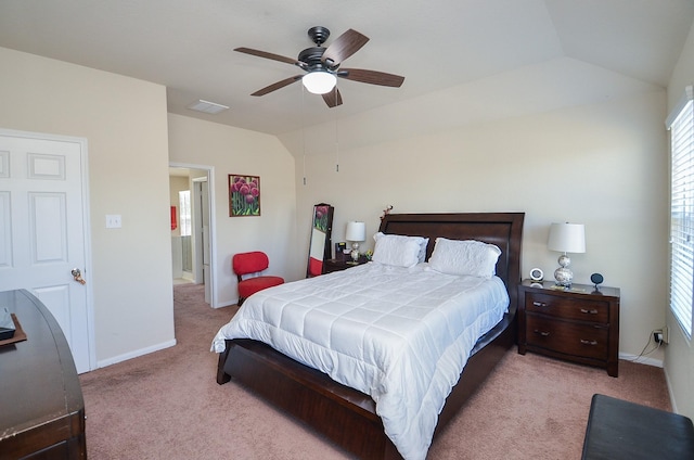 bedroom with light carpet, ceiling fan, and lofted ceiling