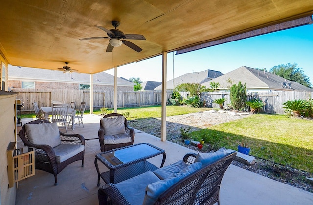 view of patio featuring an outdoor living space and ceiling fan