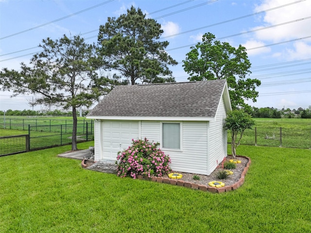 view of outbuilding featuring a yard