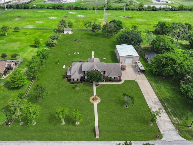 birds eye view of property featuring a rural view