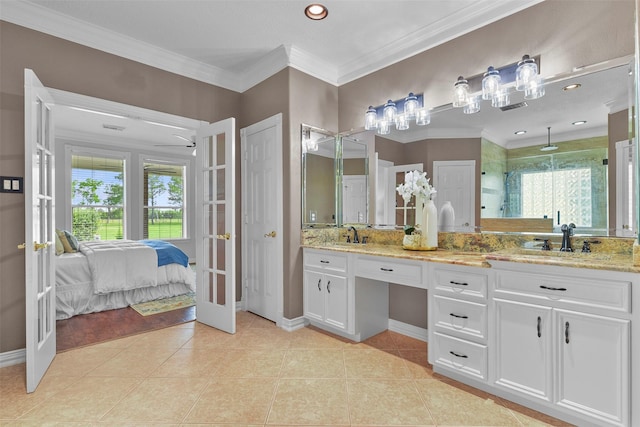 bathroom with vanity, french doors, crown molding, tile patterned flooring, and an enclosed shower