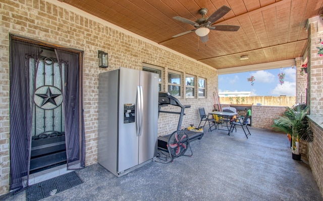 view of patio featuring ceiling fan