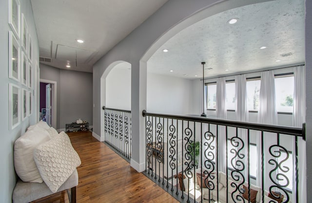 hallway featuring hardwood / wood-style flooring