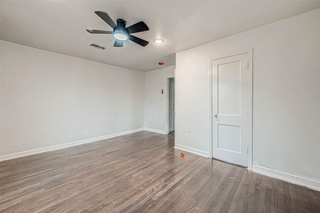 unfurnished bedroom featuring hardwood / wood-style flooring and ceiling fan