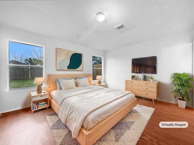 bedroom featuring hardwood / wood-style floors