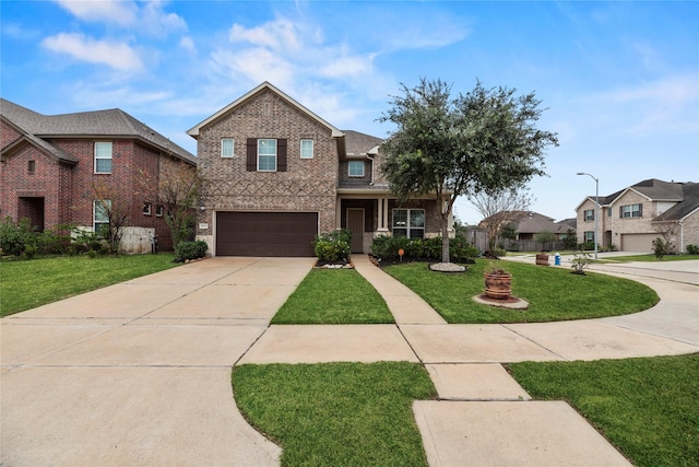 view of front facade with a garage and a front lawn