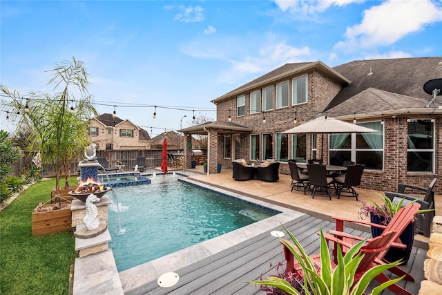 view of pool with pool water feature