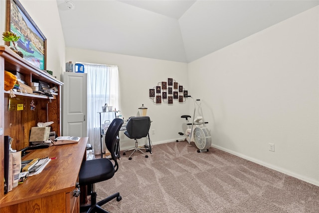 office with light carpet and lofted ceiling