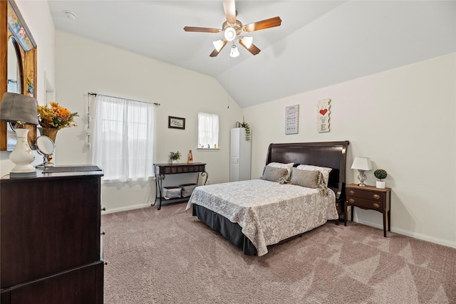 carpeted bedroom with ceiling fan and lofted ceiling