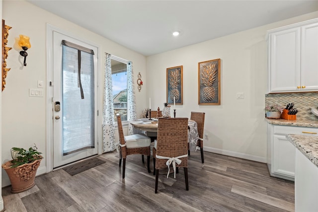 dining area featuring hardwood / wood-style flooring