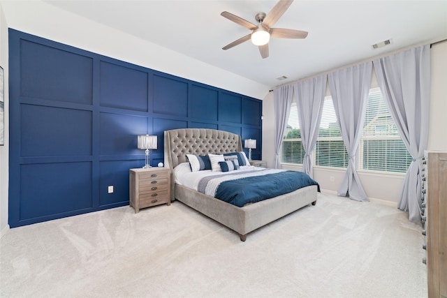 carpeted bedroom with lofted ceiling and ceiling fan