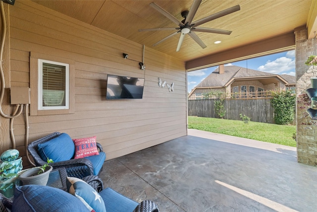 view of patio / terrace featuring ceiling fan