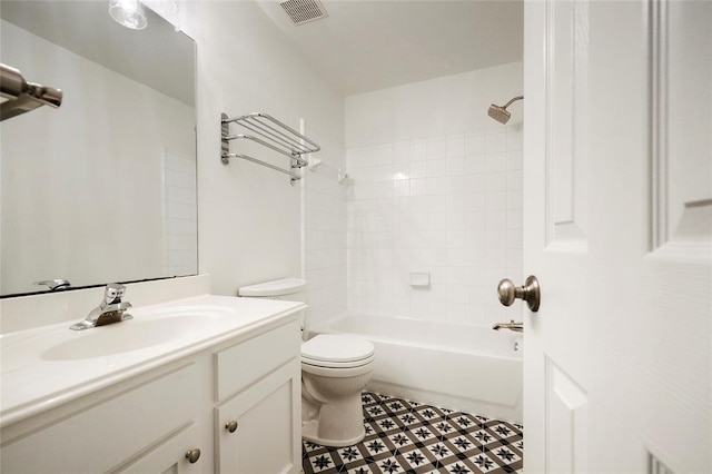 full bathroom featuring toilet, tile patterned flooring, vanity, and shower / tub combination