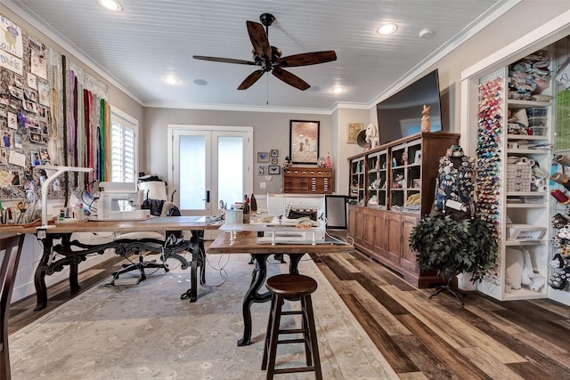 home office featuring crown molding, hardwood / wood-style flooring, french doors, and ceiling fan