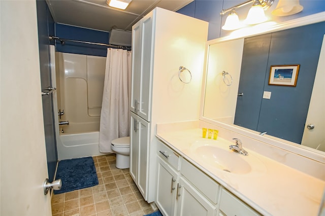 full bathroom with vanity, shower / bath combination with curtain, and toilet