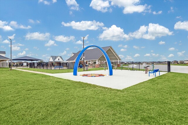 view of jungle gym featuring a lawn