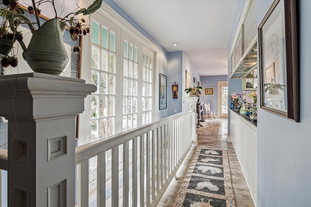 corridor featuring light hardwood / wood-style flooring