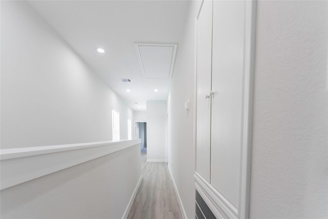 corridor featuring light hardwood / wood-style flooring