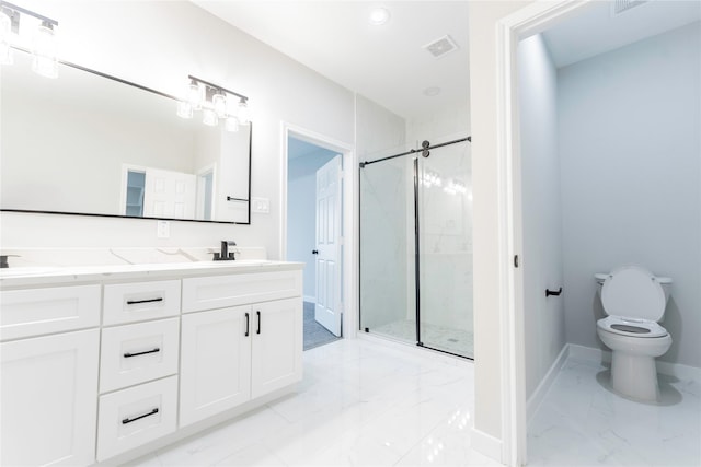 bathroom with an enclosed shower, vanity, and toilet