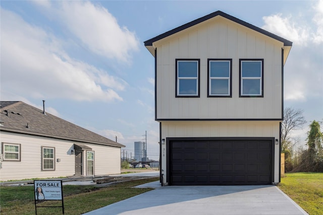 view of home's exterior featuring a lawn and a garage