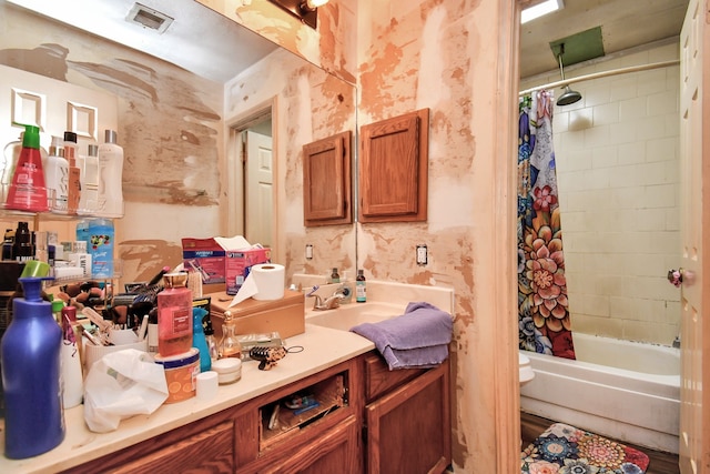 full bathroom featuring vanity, toilet, and shower / bathtub combination with curtain