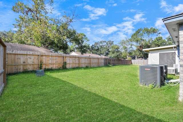 view of yard featuring central AC