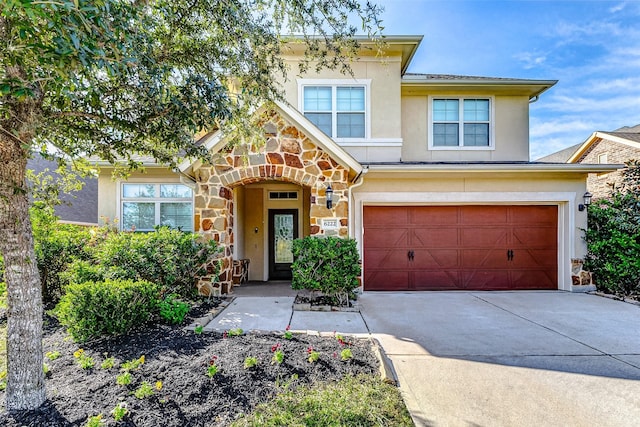 view of front of property with a garage