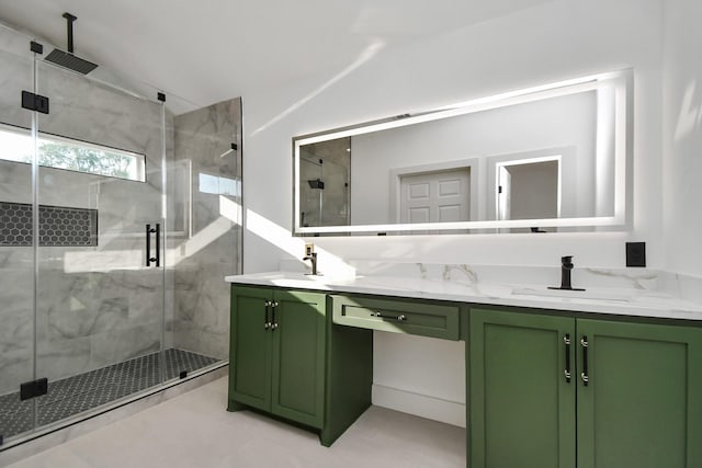 bathroom featuring tile patterned flooring, lofted ceiling, vanity, and a shower with shower door