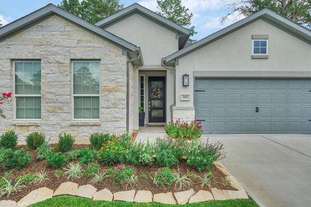 view of front of property with a garage