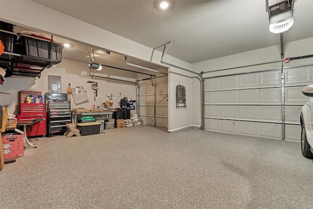 garage featuring a garage door opener