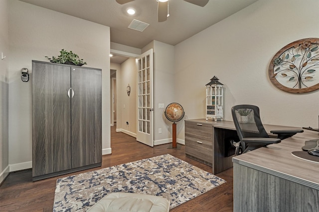 home office featuring ceiling fan and dark wood-type flooring