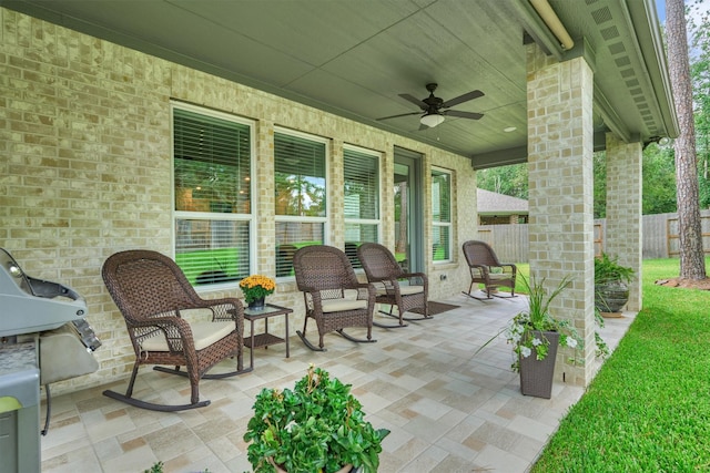 view of patio featuring ceiling fan and area for grilling