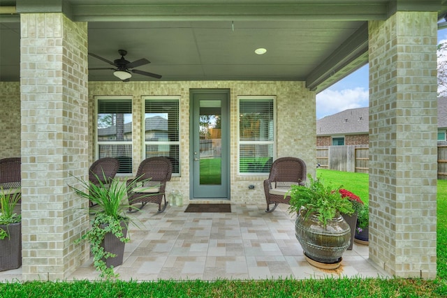 view of patio featuring ceiling fan