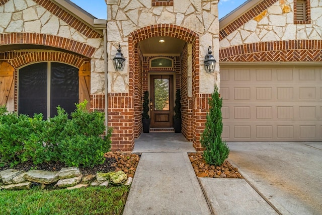 entrance to property featuring a garage