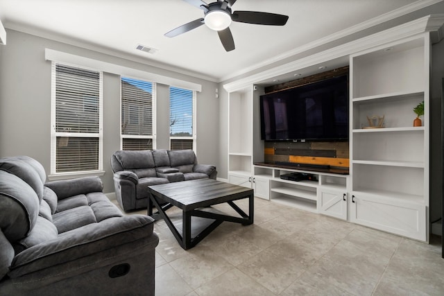 living room featuring crown molding and ceiling fan