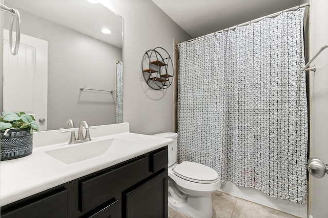 bathroom featuring tile patterned floors, vanity, toilet, and a shower with shower curtain