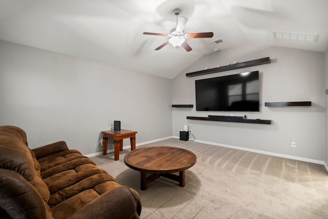 living room featuring light colored carpet, ceiling fan, and lofted ceiling