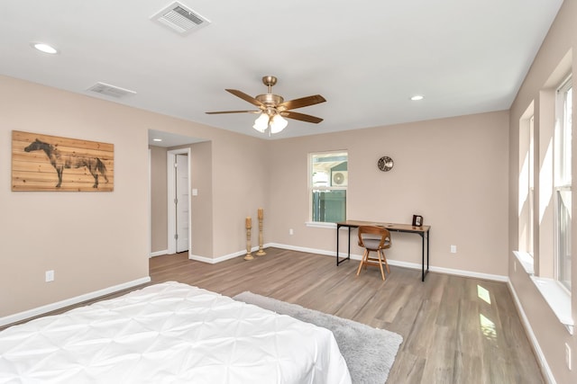 bedroom featuring ceiling fan and light wood-type flooring